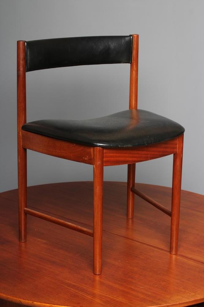 A McINTOSH TEAK DINING TABLE AND CHAIRS Image