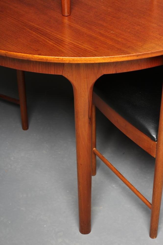 A McINTOSH TEAK DINING TABLE AND CHAIRS Image