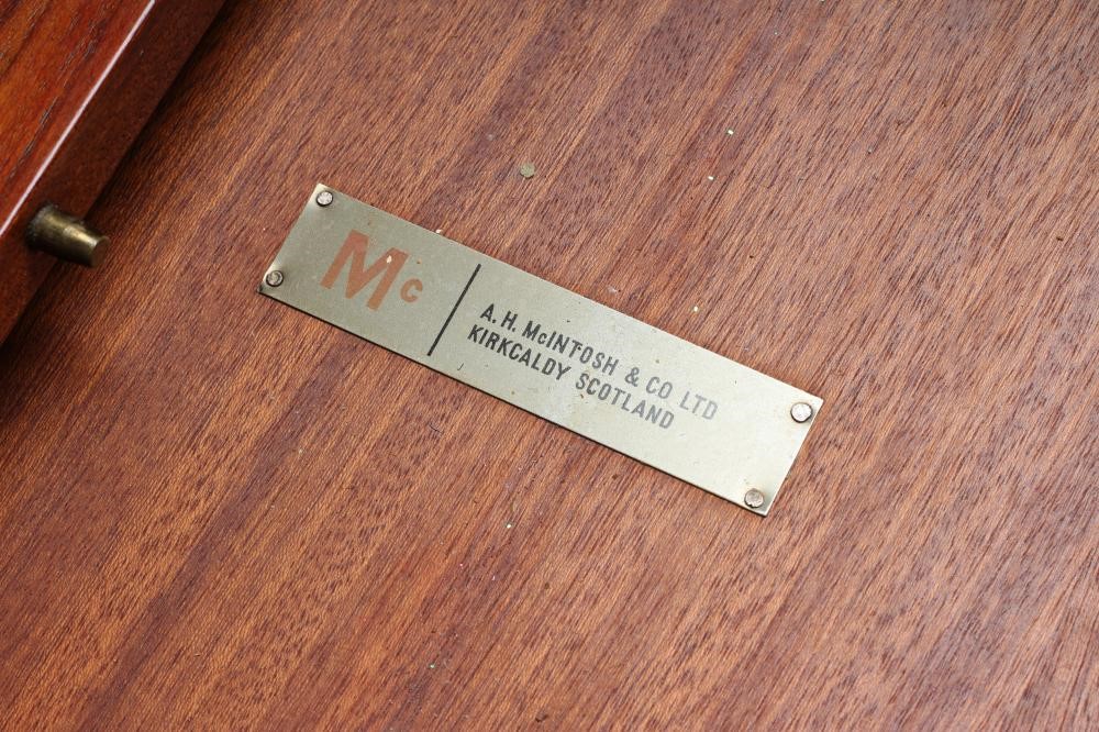 A McINTOSH TEAK DINING TABLE AND CHAIRS Image