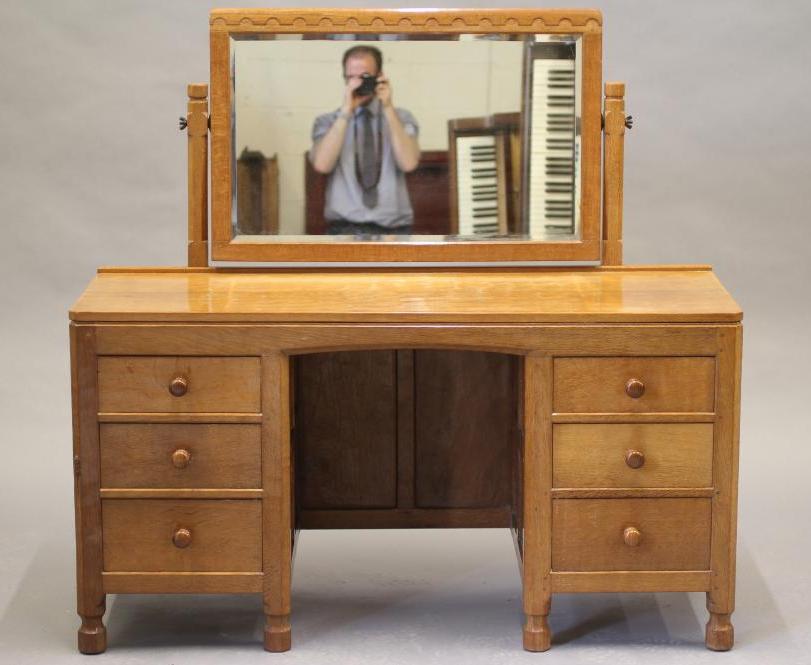 A ROBERT THOMPSON ADZED OAK DRESSING TABLE Image
