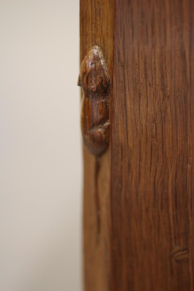 A ROBERT THOMPSON ADZED OAK DRESSING TABLE Image