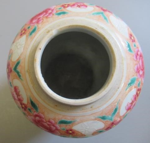 A CHINESE PORCELAIN FAMILLE ROSE JAR of ovoid form painted with roundels of peonies on a scattered Image