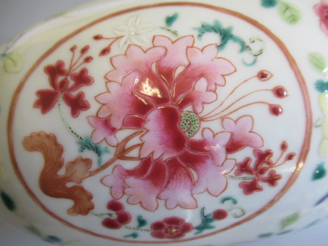 A CHINESE PORCELAIN FAMILLE ROSE JAR of ovoid form painted with roundels of peonies on a scattered Image