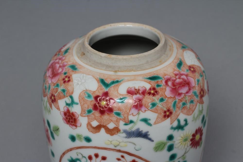 A CHINESE PORCELAIN FAMILLE ROSE JAR of ovoid form painted with roundels of peonies on a scattered Image