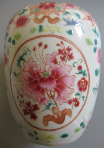 A CHINESE PORCELAIN FAMILLE ROSE JAR of ovoid form painted with roundels of peonies on a scattered Image