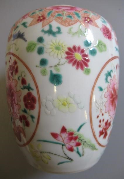 A CHINESE PORCELAIN FAMILLE ROSE JAR of ovoid form painted with roundels of peonies on a scattered Image