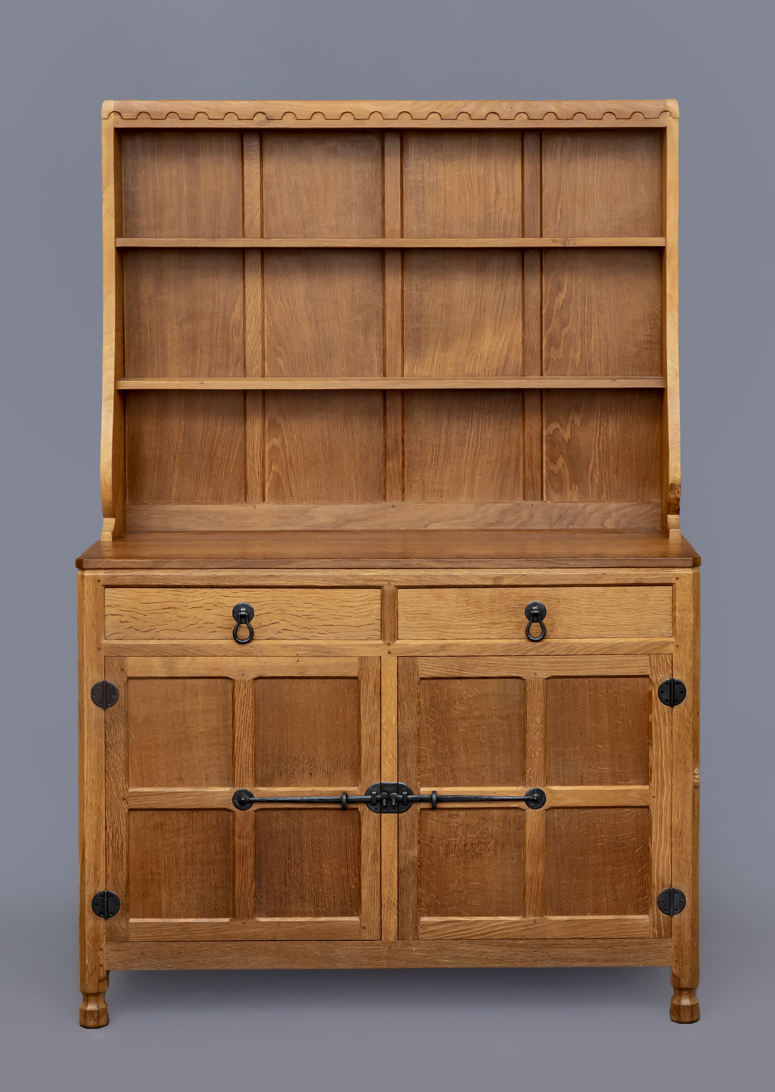 A ROBERT THOMPSON ADZED OAK DRESSER Image
