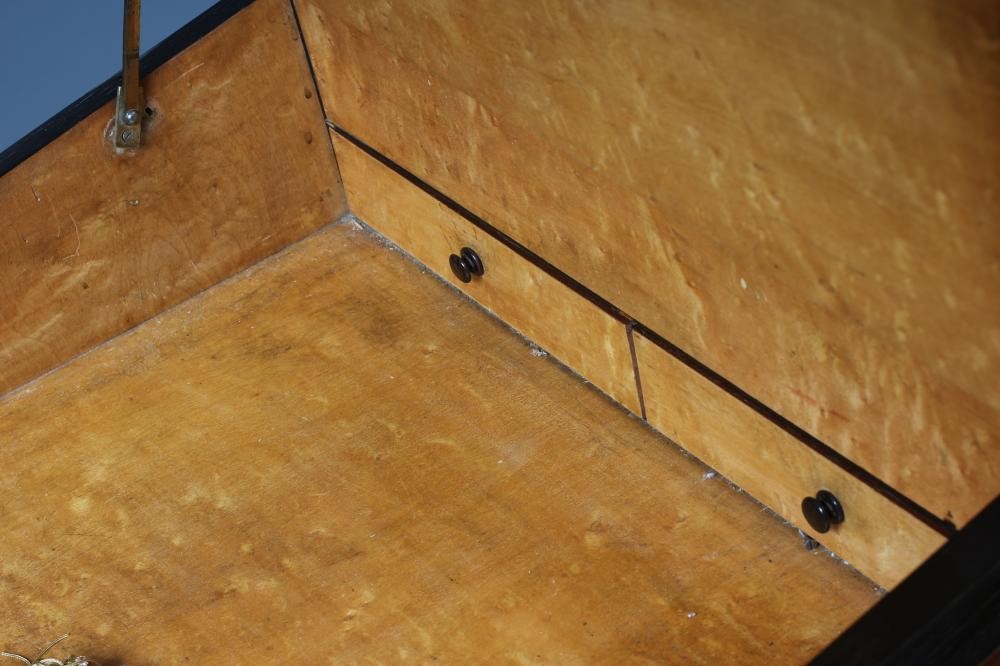 A VICTORIAN YEW AND EBONISED DAVENPORT Image