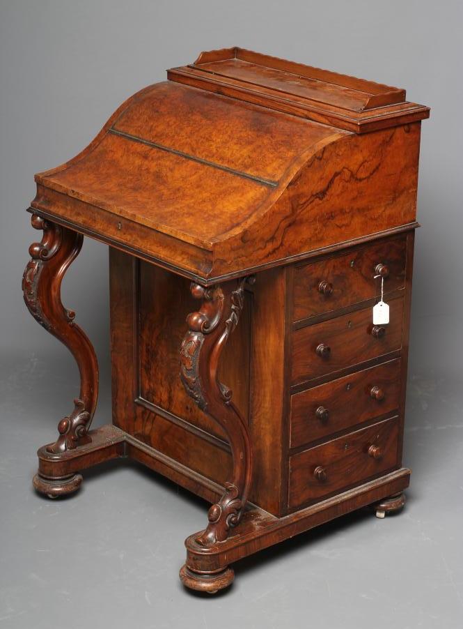 A VICTORIAN BURR WALNUT DAVENPORT Image