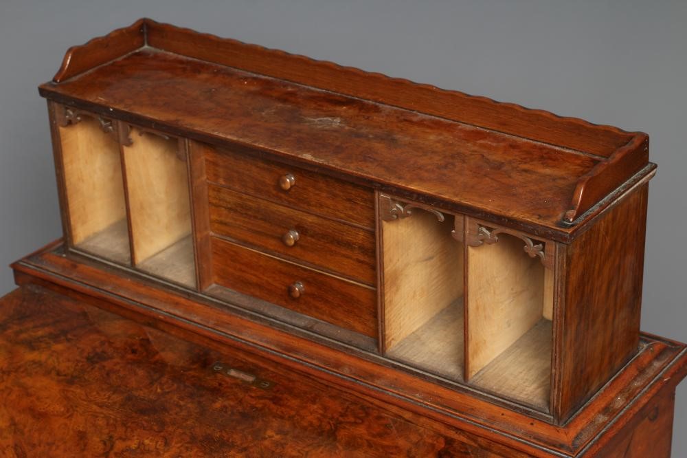 A VICTORIAN BURR WALNUT DAVENPORT Image