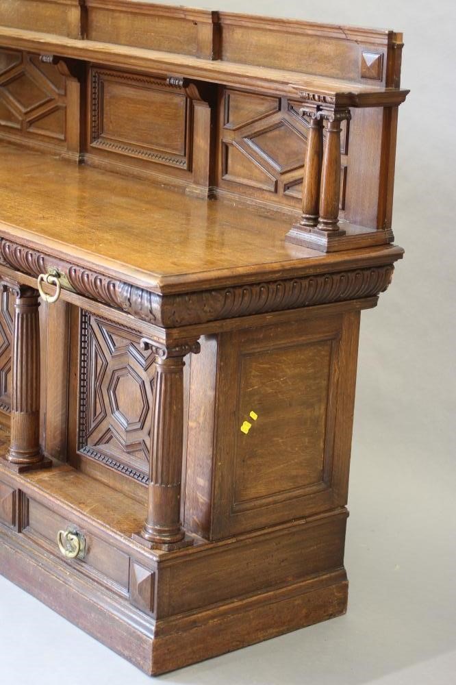 A VICTORIAN CARVED OAK SIDEBOARD BY MARSH Image