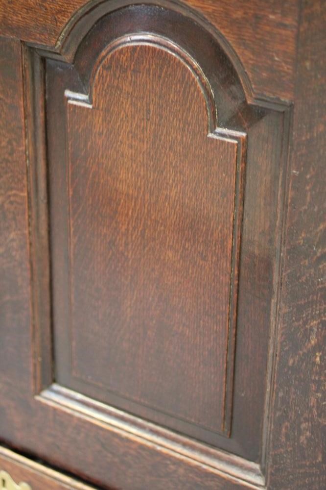 A GEORGIAN OAK PANELLED CHEST Image