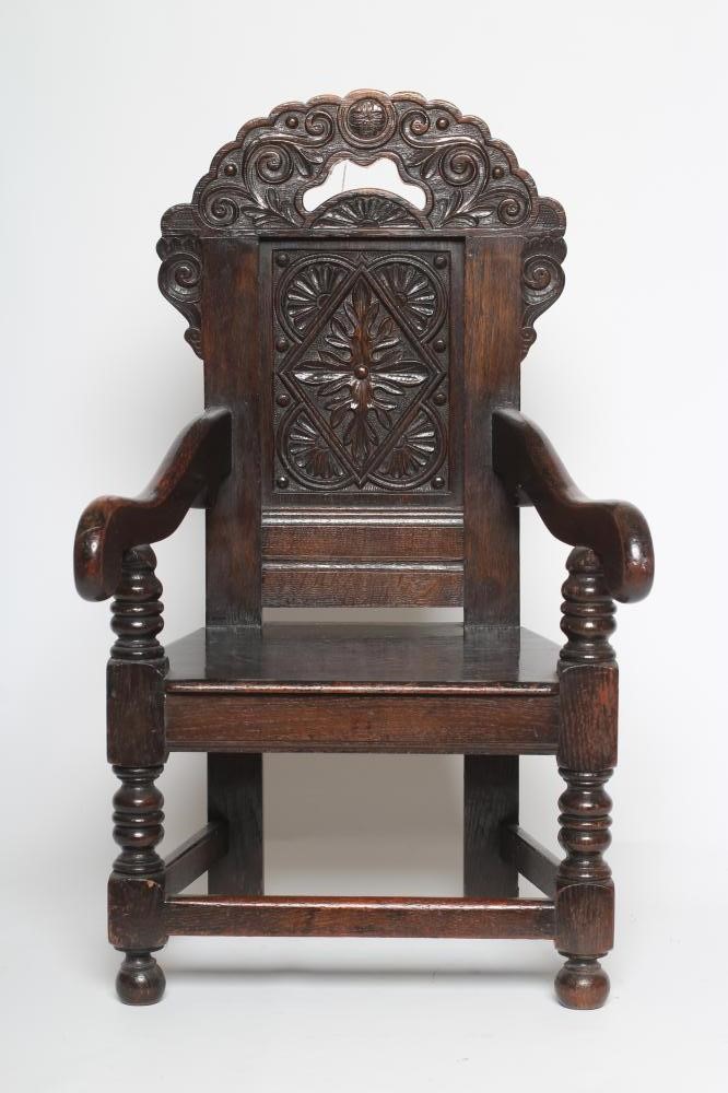 A CHILDS JOINED OAK ARMCHAIR Image