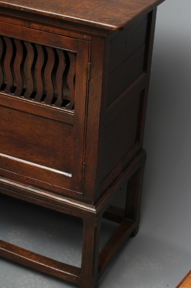 A JOINED OAK LIVERY CUPBOARD Image