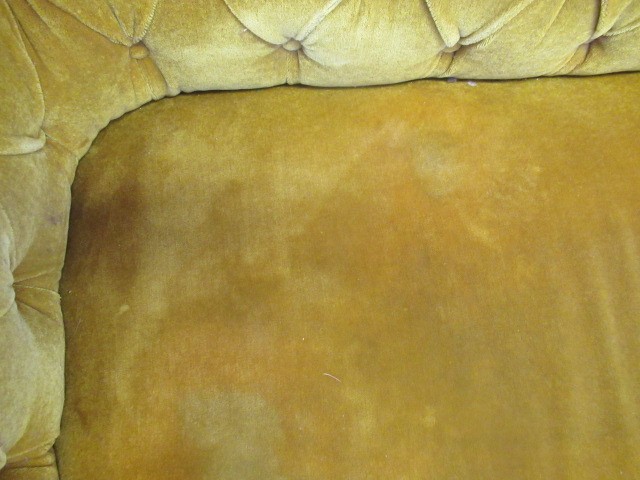 A VICTORIAN WALNUT FRAMED CHESTERFIELD DROP END SETTEE button upholstered in mustard yellow Image