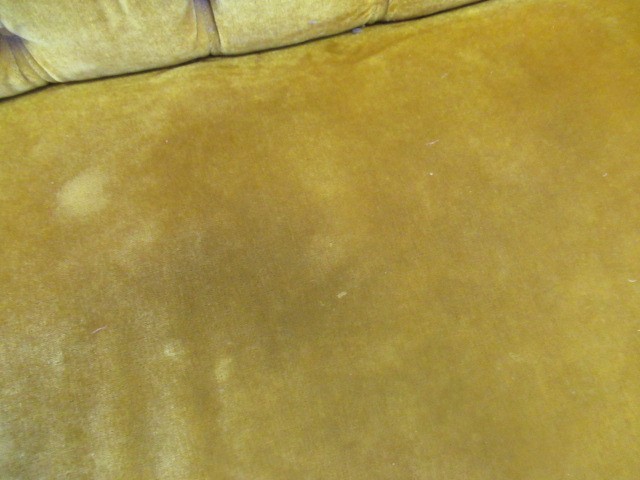 A VICTORIAN WALNUT FRAMED CHESTERFIELD DROP END SETTEE button upholstered in mustard yellow Image