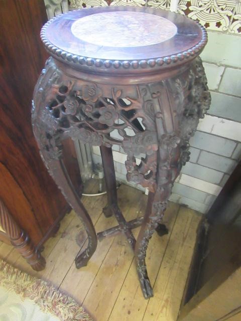 A CHINESE HARDWOOD JARDINIERE STAND Image