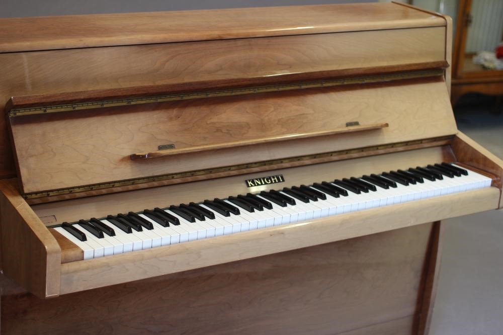 A MODEL K UPRIGHT PIANO BY KNIGHT Image
