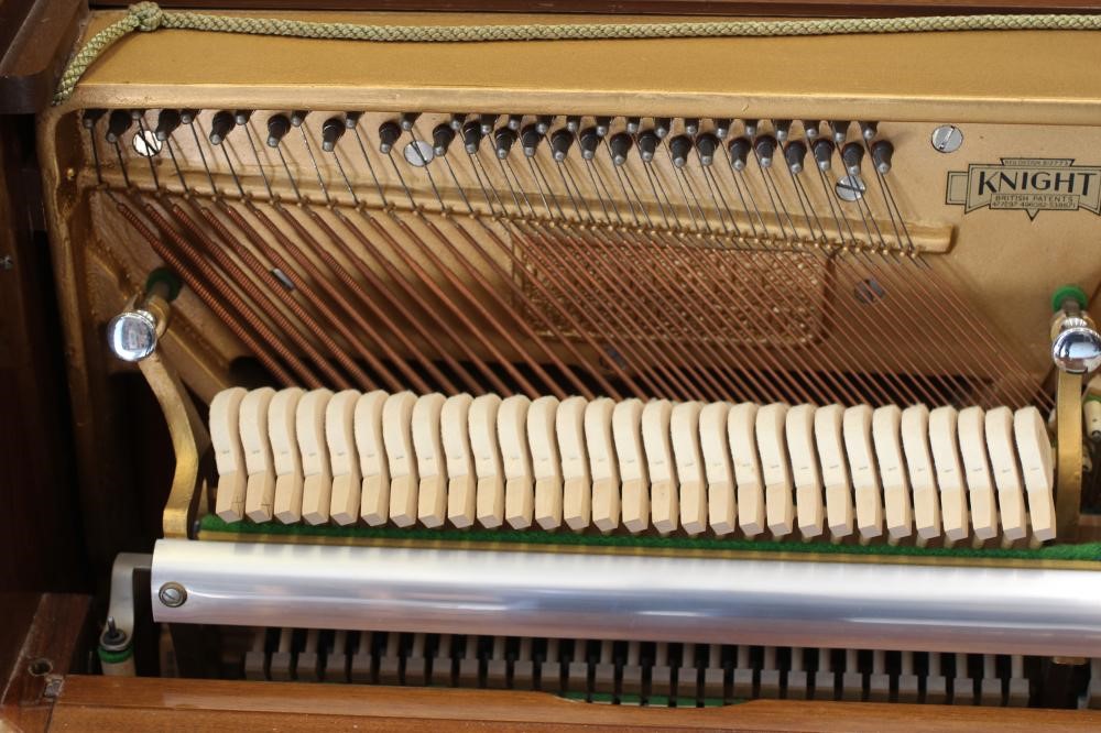 A MODEL K UPRIGHT PIANO BY KNIGHT Image