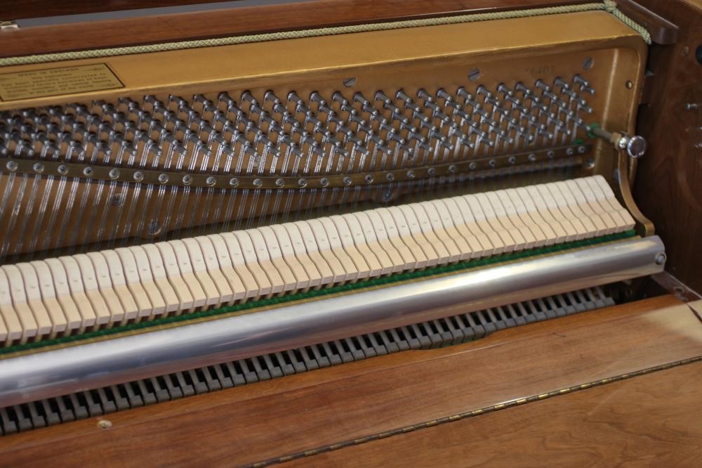 A MODEL K UPRIGHT PIANO BY KNIGHT Image