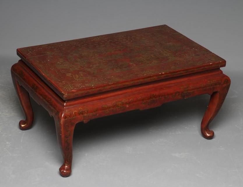 A CHINESE RED LACQUERED LOW TABLE Image