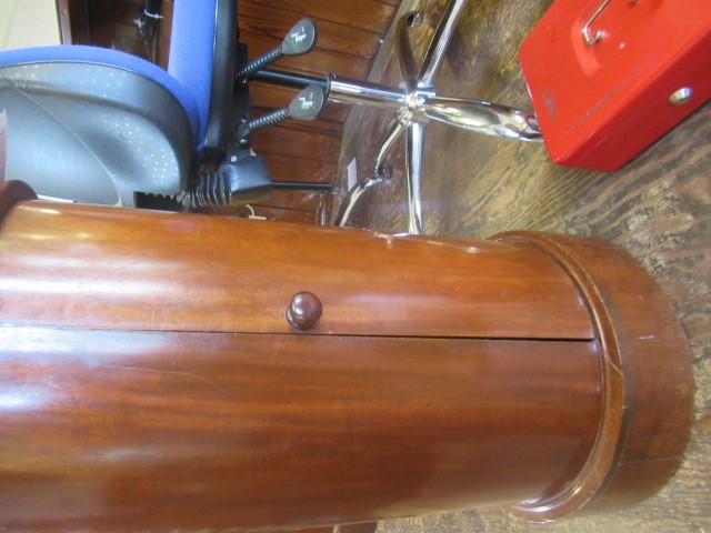 A PAIR OF VICTORIAN MAHOGANY BEDSIDE CABINETS of cylindrical form with inset veined white marble top Image