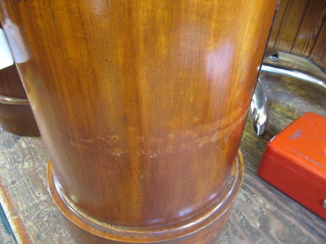 A PAIR OF VICTORIAN MAHOGANY BEDSIDE CABINETS of cylindrical form with inset veined white marble top Image