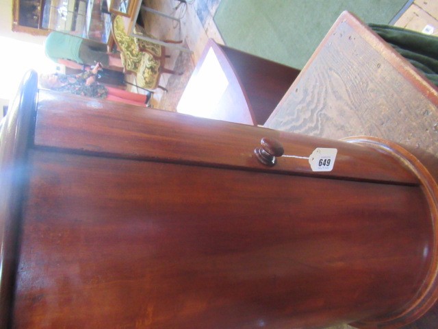 A PAIR OF VICTORIAN MAHOGANY BEDSIDE CABINETS of cylindrical form with inset veined white marble top Image