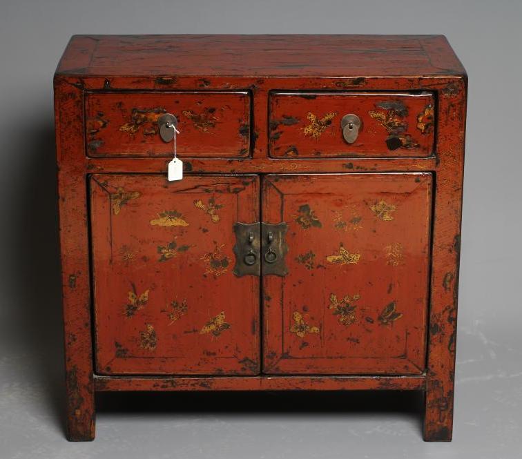 A CHINESE RED LACQUERED CABINET Image