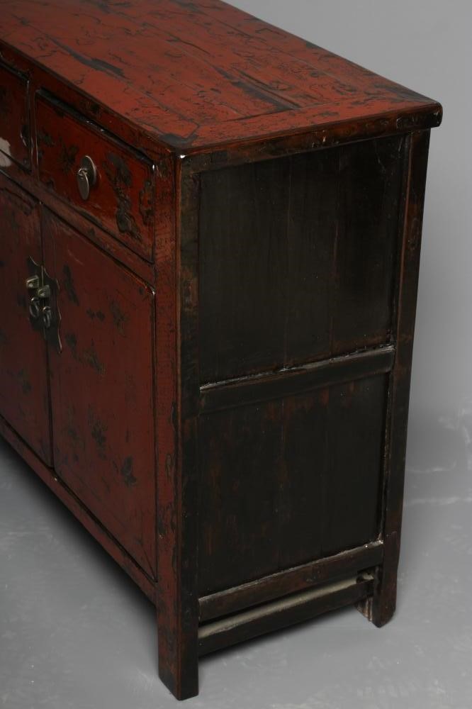 A CHINESE RED LACQUERED CABINET Image