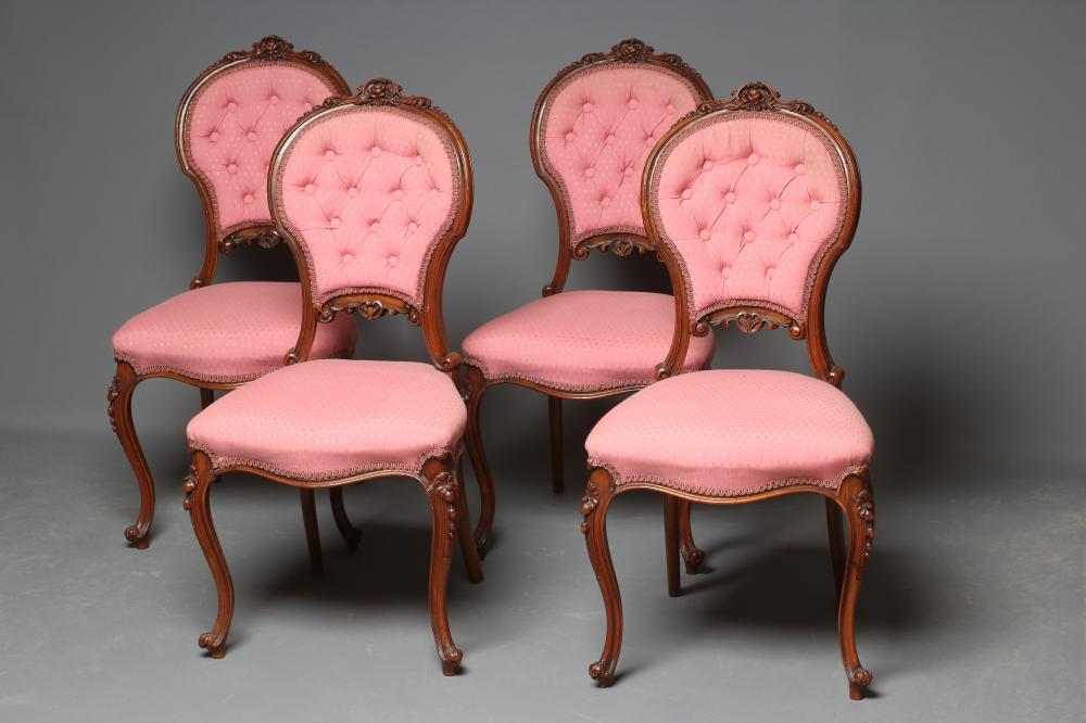 A SET OF FOUR VICTORIAN WALNUT BALLOON BACK SALON CHAIRS button upholstered in a pink weave Image