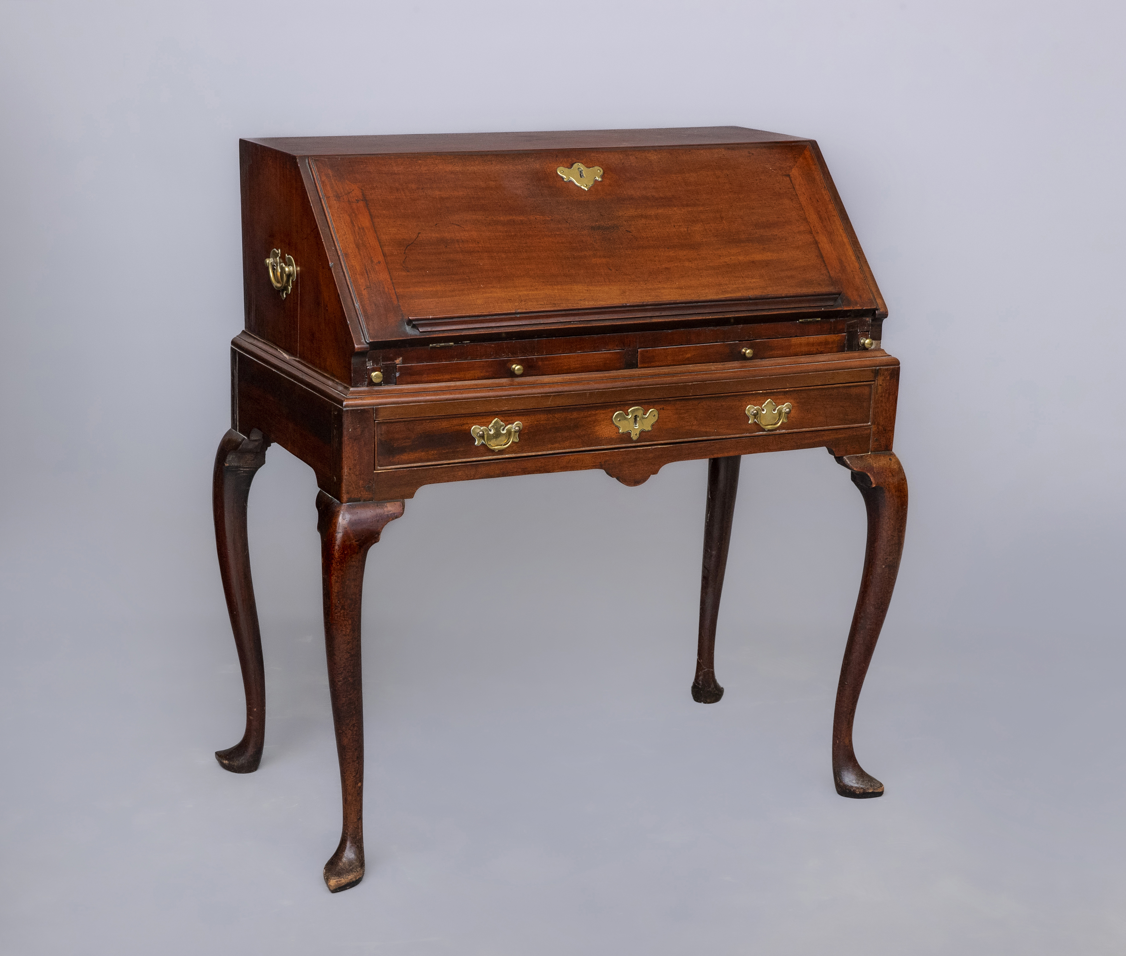 A GEORGIAN MAHOGANY BUREAU ON STAND Image