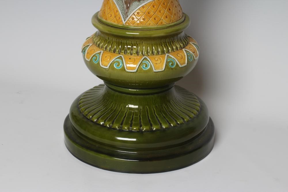 A BURMANTOFTS FAIENCE JARDINIERE AND STAND Image