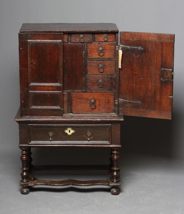 AN OAK CHEST ON STAND Image
