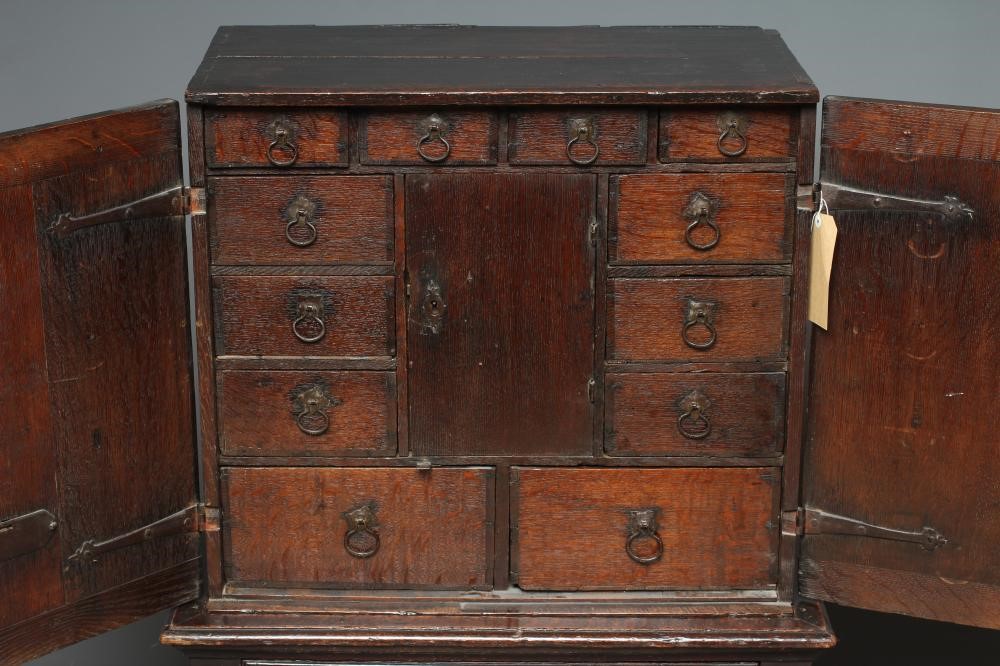 AN OAK CHEST ON STAND Image