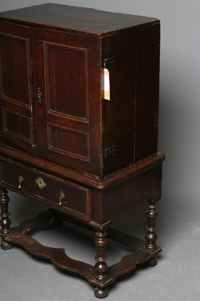 AN OAK CHEST ON STAND Image