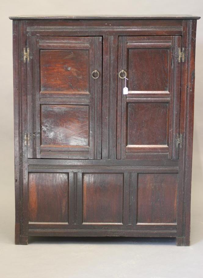 AN OAK CLOTHES PRESS Image