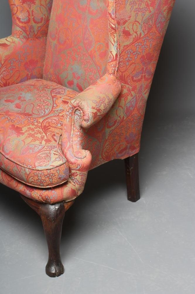 A GEORGIAN OAK FRAMED WING ARMCHAIR Image