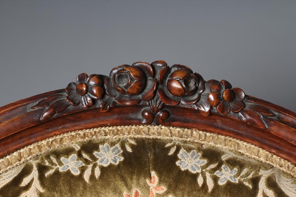 A VICTORIAN WALNUT SHOW FRAME NURSING CHAIR button upholstered in green cut velvet Image