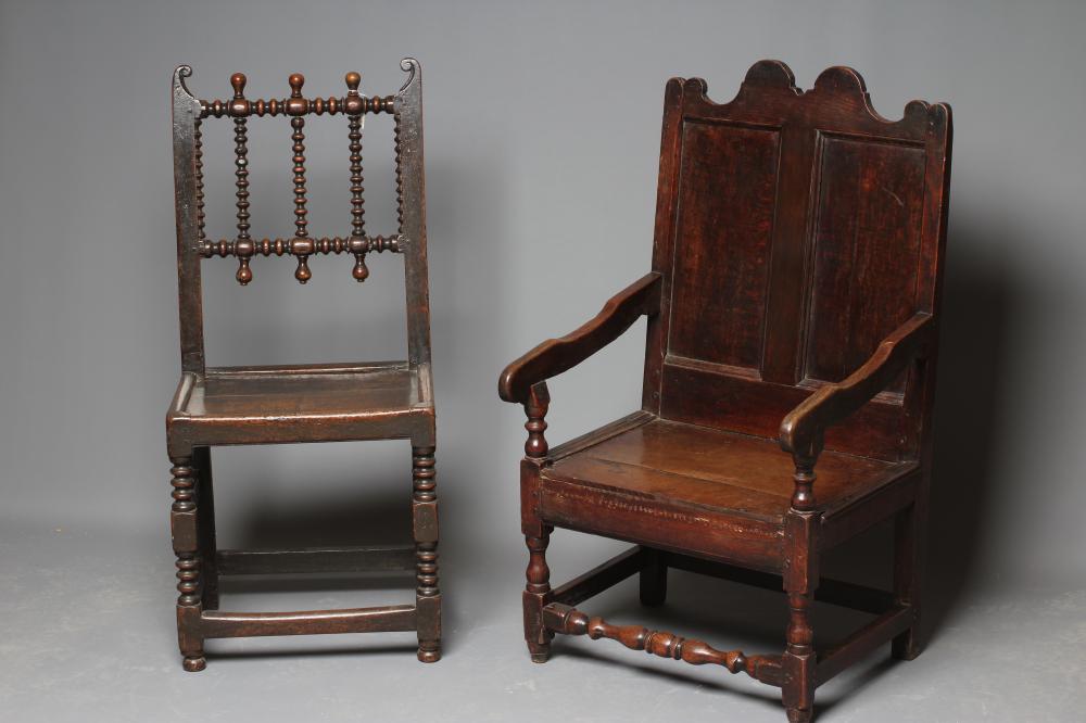 A JOINED OAK ARMCHAIR Image