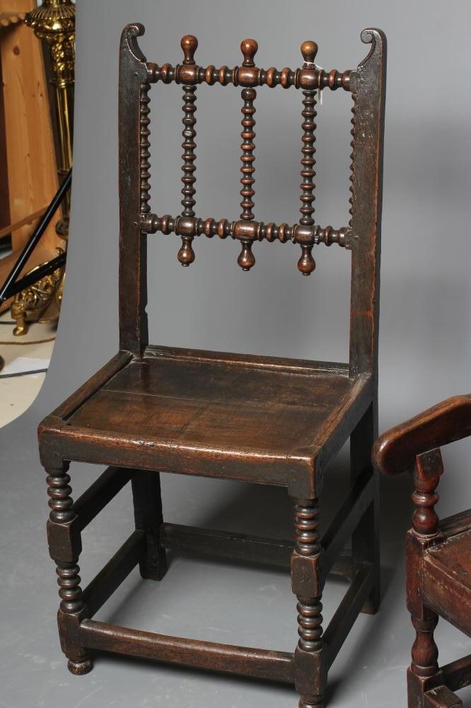 A JOINED OAK ARMCHAIR Image