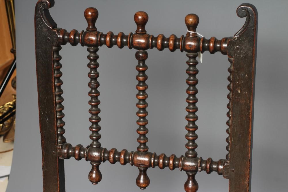 A JOINED OAK ARMCHAIR Image