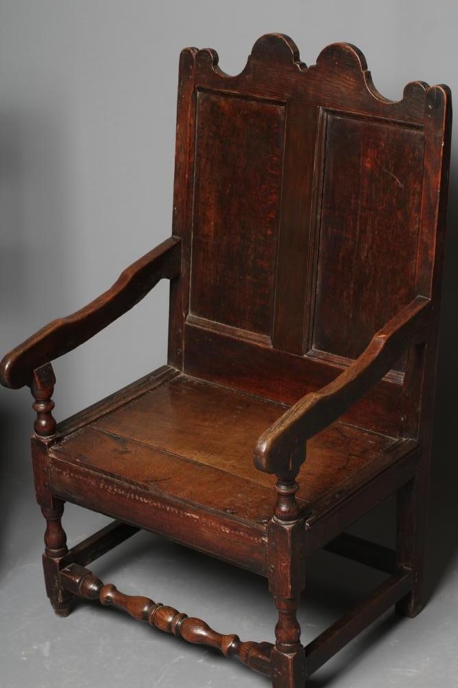 A JOINED OAK ARMCHAIR Image