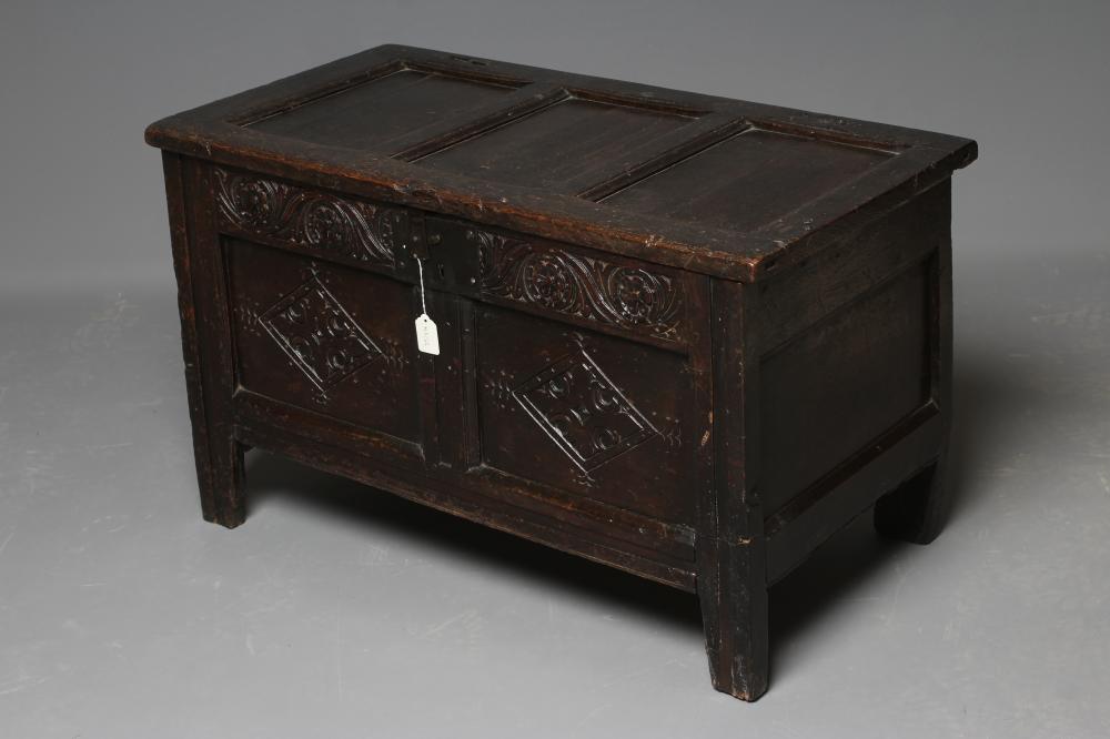 A JOINED OAK PANELLED COFFER Image