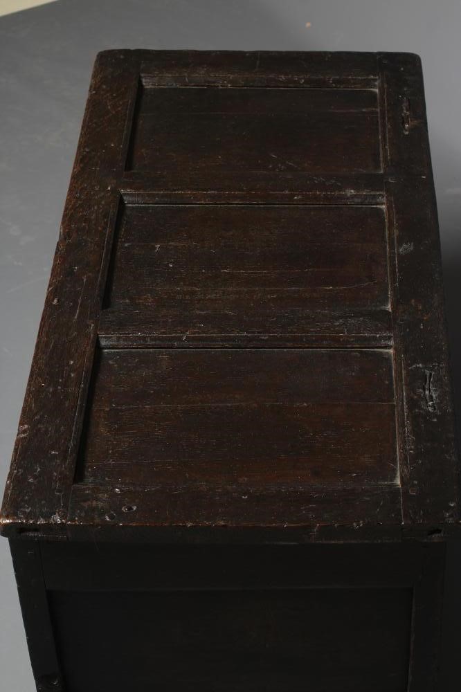 A JOINED OAK PANELLED COFFER Image