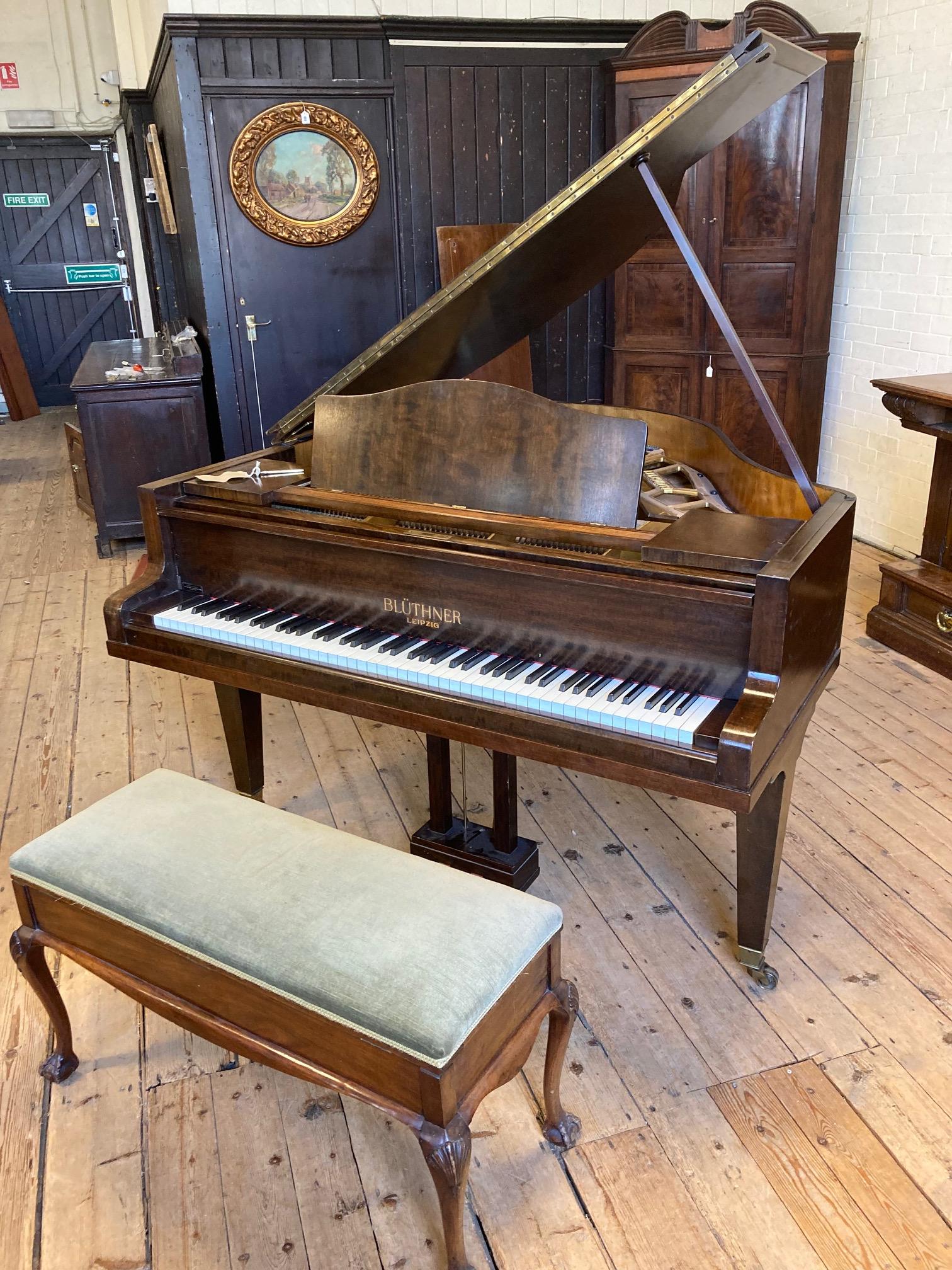 A BLUTHNER BABY GRAND PIANO Image