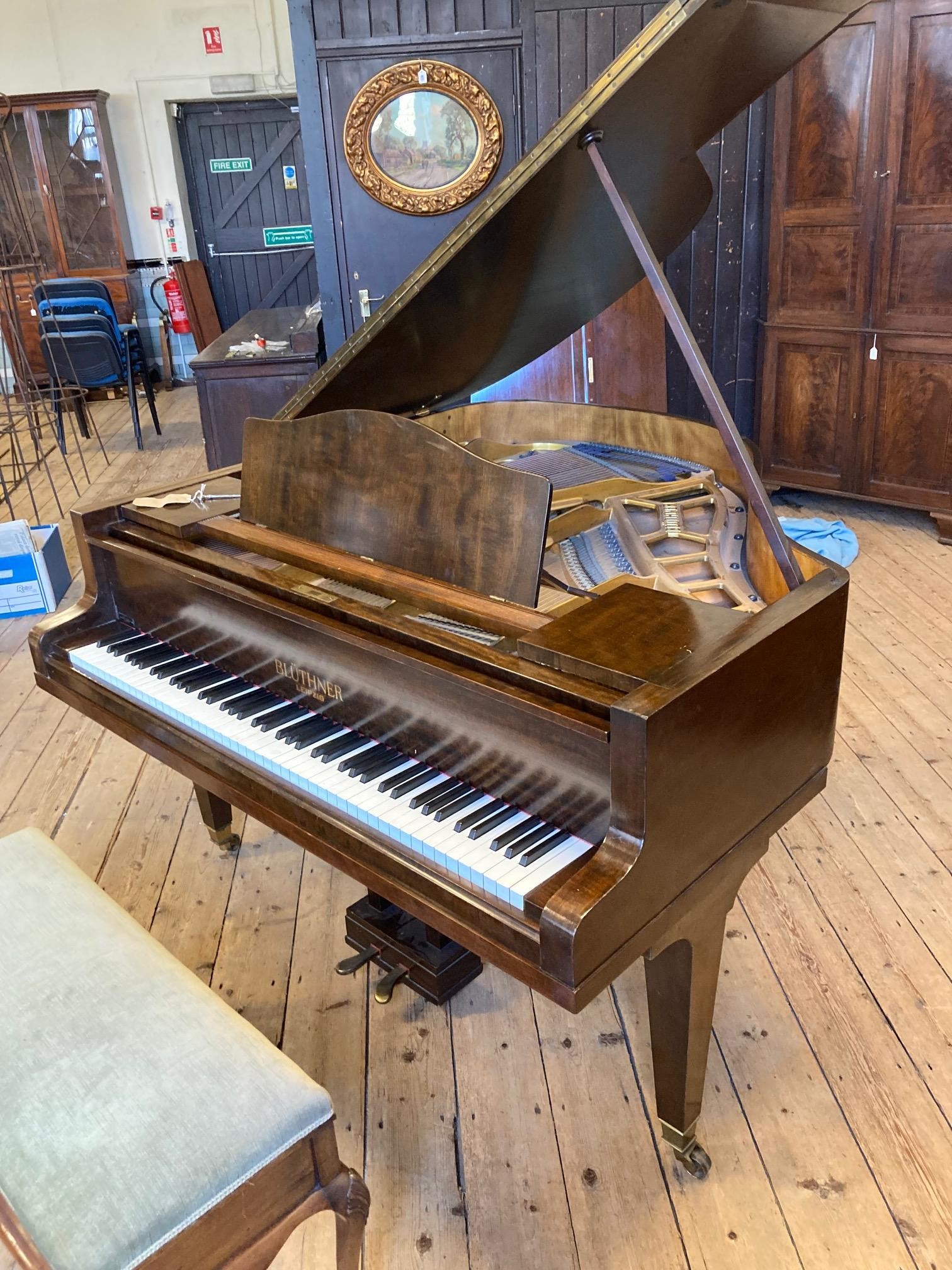 A BLUTHNER BABY GRAND PIANO Image