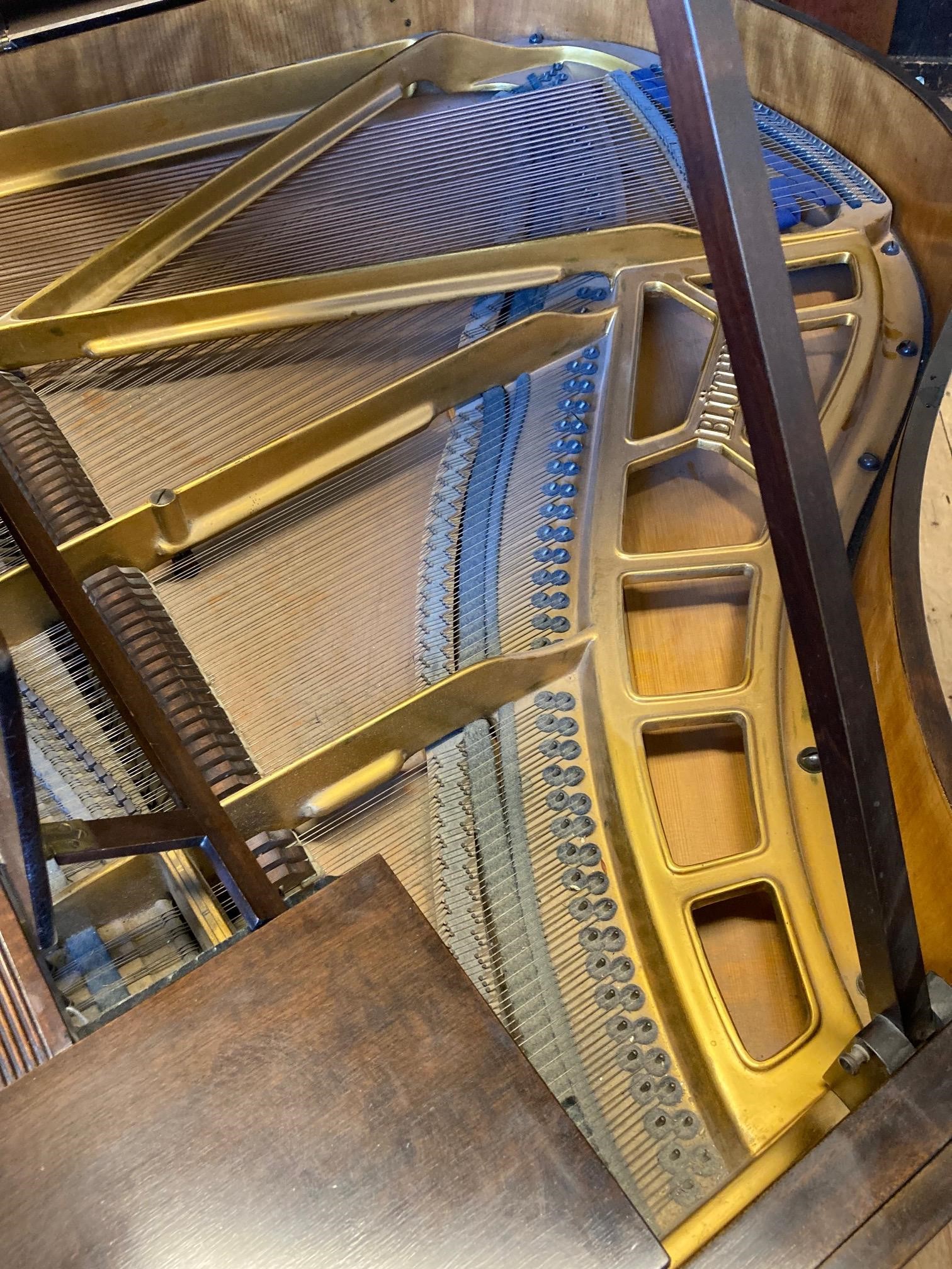 A BLUTHNER BABY GRAND PIANO Image