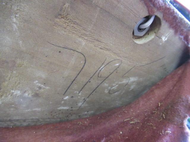 AN ART DECO GOLDSCHEIDER EARTHENWARE FIGURE modelled as a young fashionable lady wearing a wide Image