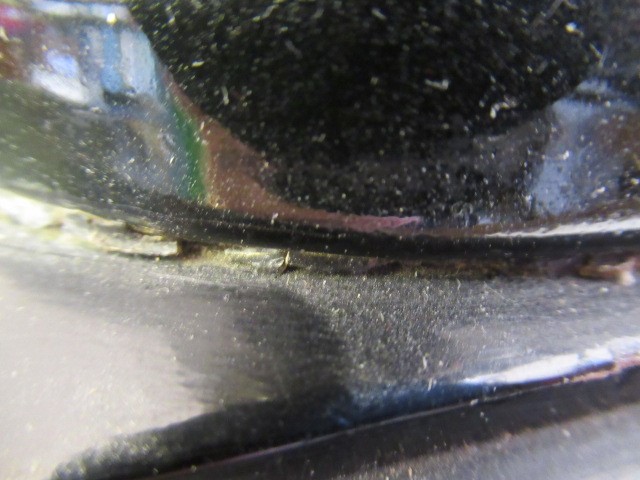 AN ART DECO GOLDSCHEIDER EARTHENWARE FIGURE modelled as a young fashionable lady wearing a wide Image